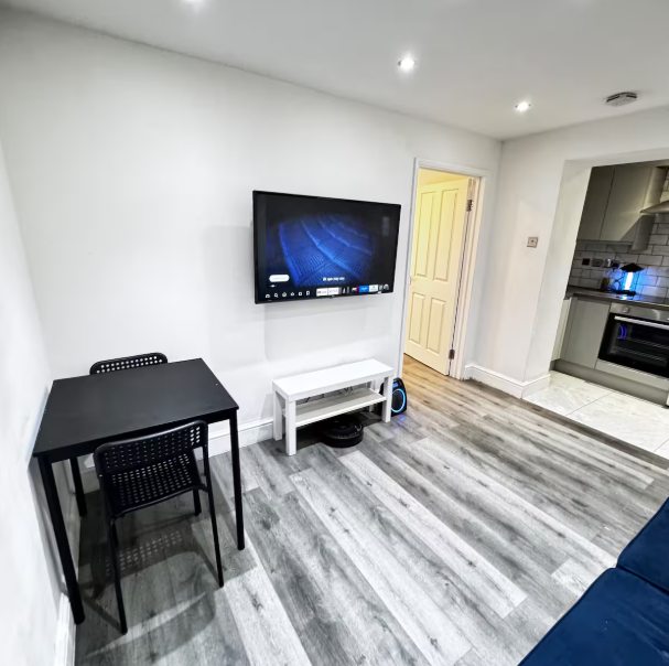 Whitehall Lane one-bedroom apartment photo 9: living room and kitchen area.